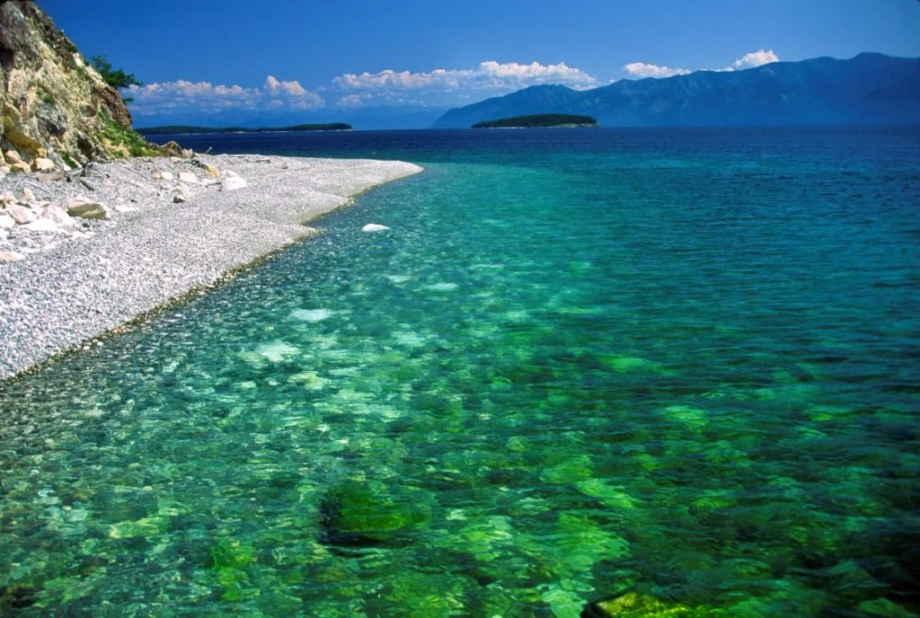 Lake Baikal is the oldest (25 million years), deepest (5700 feet) and largest lake in the world by volume(it holds 20% of the earth's liquid fresh water).